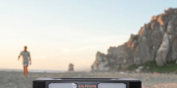 How does the battery back up generator charge the car?